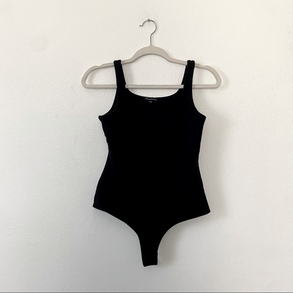 Black women’s medium body suit